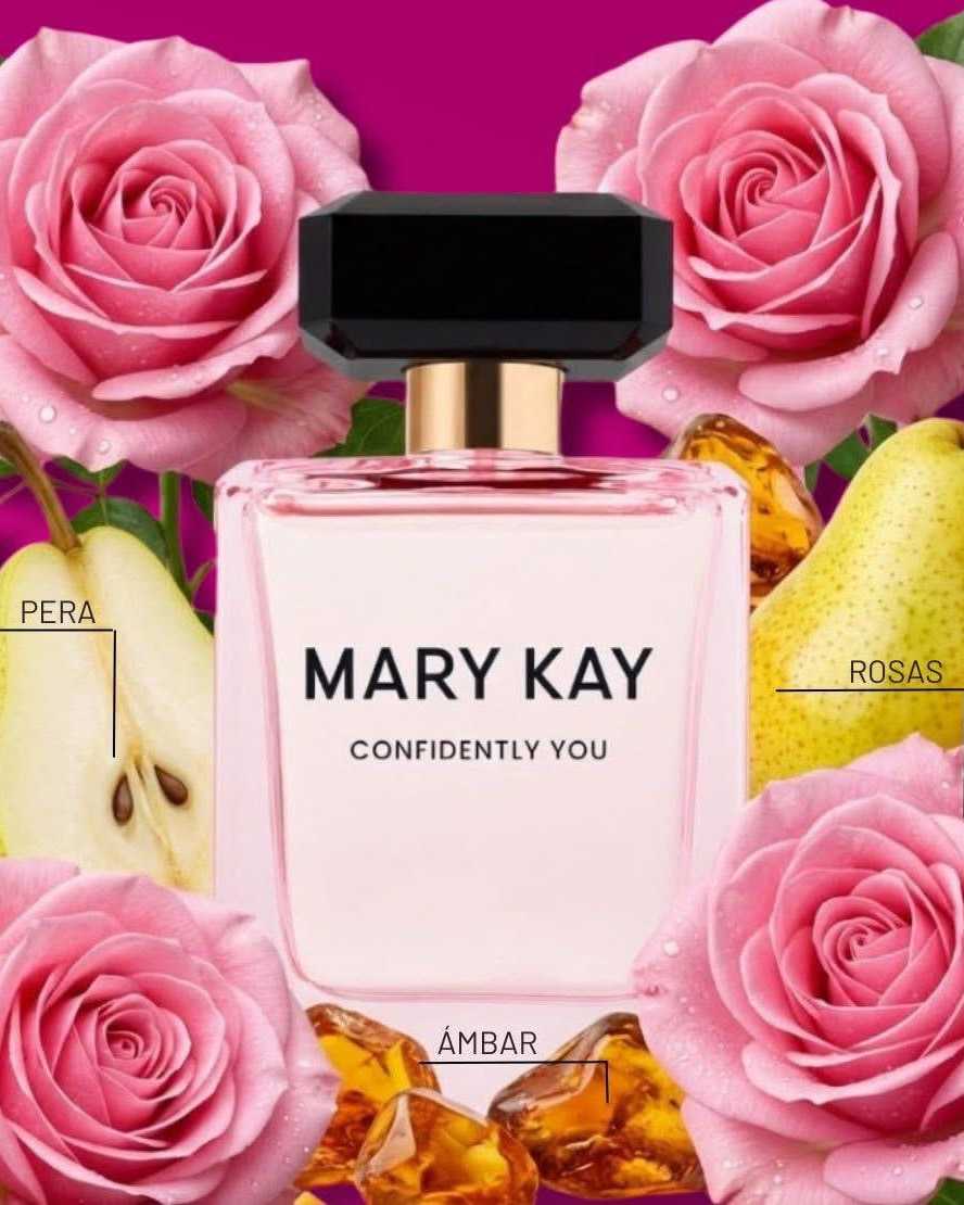Square blush-pink perfume bottle with a black faceted cap, framed by pink roses
