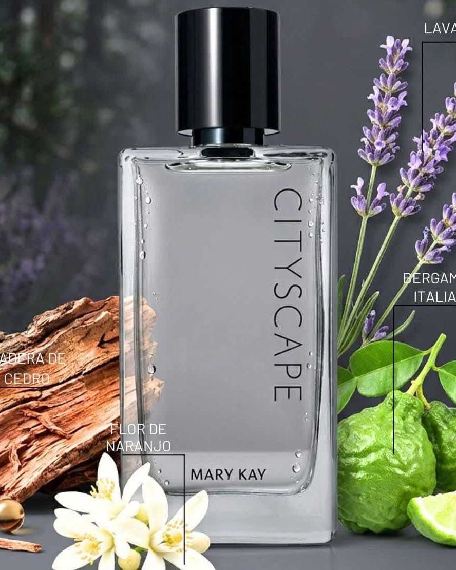 Clear rectangular cologne bottle with a black cap beside lavender and cedar bark
